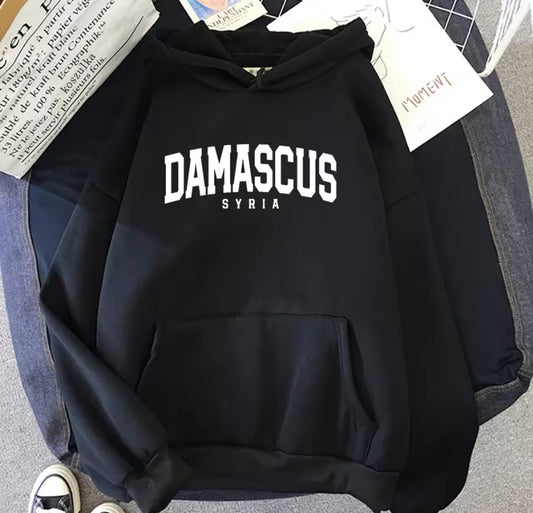 Hoodie with the word Damascus and Syria printed in English 💚🤍 Suitable for men and women....